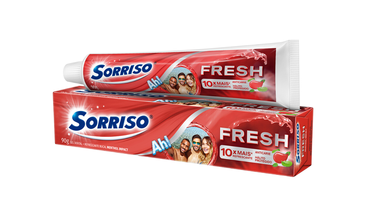 Imagem do tubo e da caixa do creme dental Sorriso Fresh Menthol Impact.